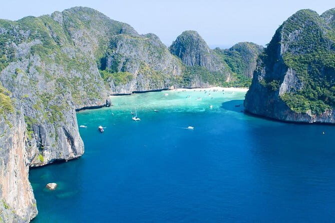 Exclusive Phi Phi, Maya Bay and Bamboo Island by Speed Boat - Viking Cave and Snorkeling: Reef Time Between Photo Moments