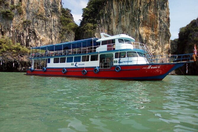 Freedom Party Boat Cruise By HYPE Boat Club Phuket - Include Pickup Transfer - On Board: Daybeds, Snacks, Wi‑Fi, and Real Conveniences