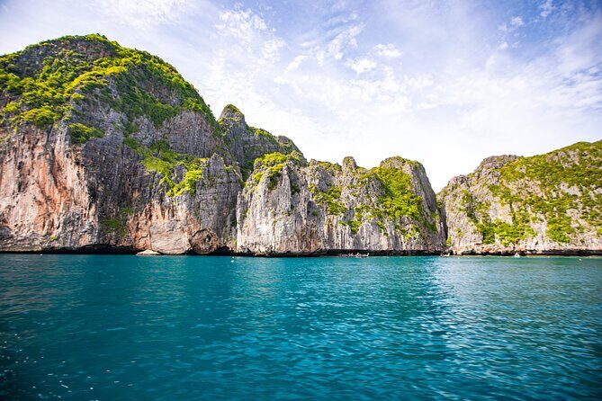 From Phuket: Phi Phi, Maya Bay & Khai Islands Speedboat Tour - Royal Phuket Marina to the Andaman Sea: How the day starts