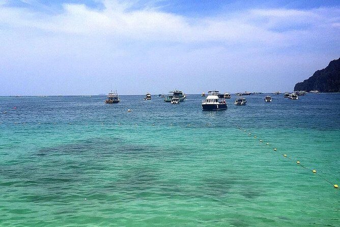 Full Day Phi Phi Islands Tour By Royal Jet Cruiser From Phuket - Phi Phi Don island time: swim, snorkel, and a real lunch break