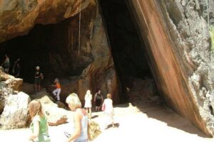 James Bond Island Sightseeing Tour by Longtail Boat from Phuket - Suwan Khuha Temple: cave temple energy before the boats