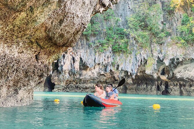 Phang Nga Bay Sunset Cruise Dinner with Sea Canoe and Loy Krathong from Phuket - Panak Island ritual: canoe into the cave, float your light