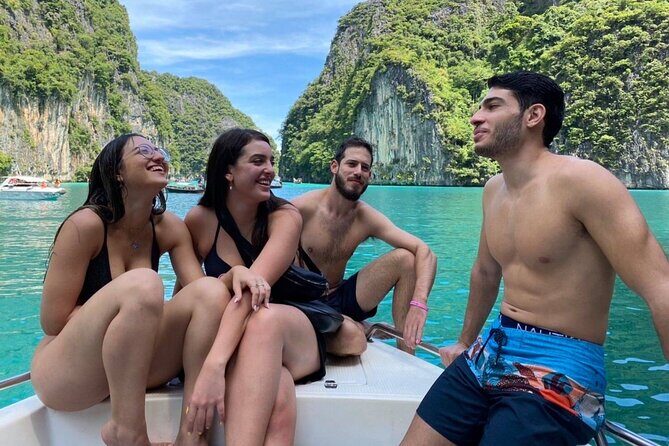 Phi Phi and Khai Islands Snorkeling Tour with Lunch by Speedboat - Pileh Bay: the lagoon swim stop with paddleboarding included