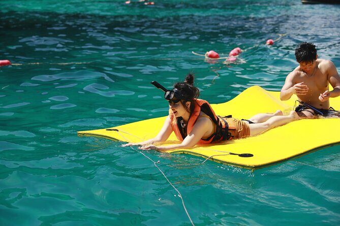 Phi Phi Island & Maiton Island Full Day Tour with Luxury Yacht - Nui Bay and Viking Cave: quick passes for classic photo stops