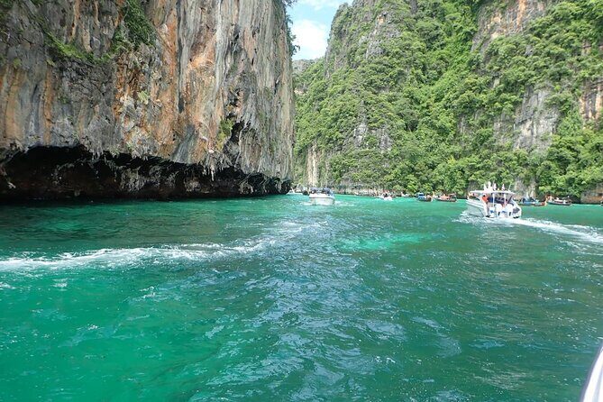 Phi Phi Island Viking Cave Monkey Beach Khai Island Tour from Phuket - Monkey Beach and Nui Bay: Short, Busy, and Weather-Dependent Energy