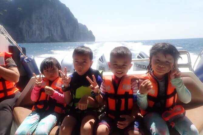 Phi Phi Islands Speedboat Full-Day Tour from Phuket+ Buffet Lunch - Maya Bay: the famous cliffs, one focused hour on shore and water