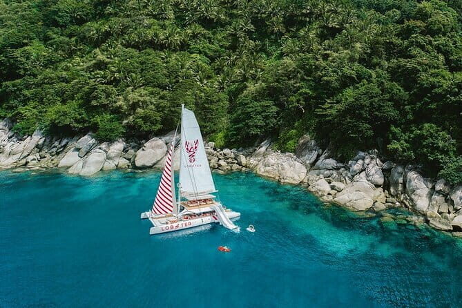 Phuket: Aeolos Catamaran Tour to Coral & Racha Islands + Lunch - Promthep Cape on the return: handline fishing and that late-day sea feeling