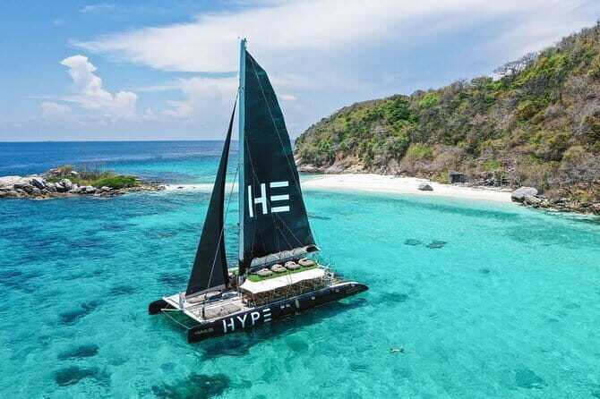 Phuket: Aeolos Catamaran Tour to Coral & Racha Islands + Lunch - What you’ll do on the water: snorkeling, paddleboards, slides, and kayak/glass options