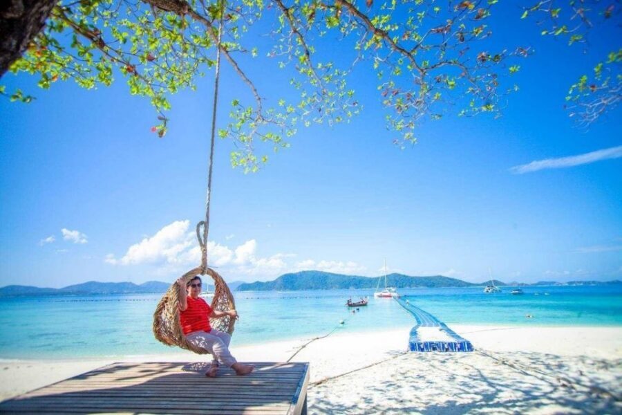Phuket: Coral Island Day Tour by Speedboat - Coral Island water time: swimming, snorkeling, and finding breathing room