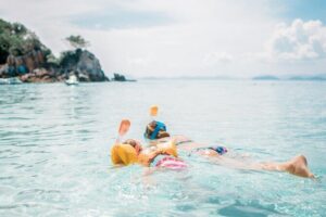 Private Boat Tour with Dolphin Spotting and Snorkelling from Phuket - Coral Island snorkeling: clear water and a real beach break