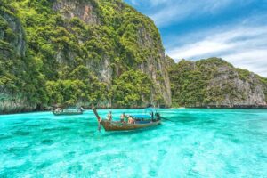 Private Phi Phi Islands & Bamboo Full Day Tour with snorkeling - Pileh Bay and the lagoon vibe: swimming with cliffs overhead