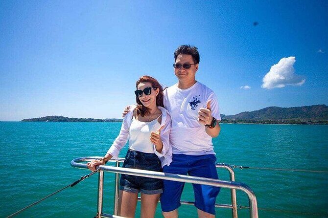 Sunset Cruise to Koh Hey in Phuket by Sailing Catamaran - Stop 2 at Koh Hey: snorkeling, swimming, and jumping from the boat