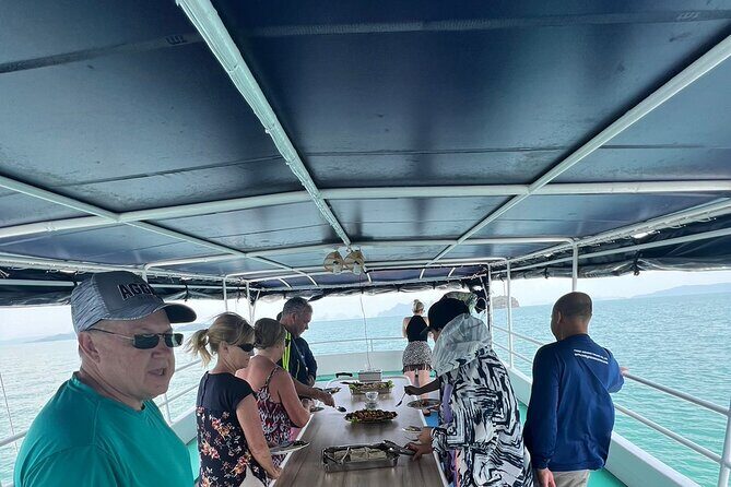 Twilight Sea Canoe Tour with Sea Cave Kayaking in Phang Nga Bay - Ao Phang Nga National Park and the onboard food rhythm